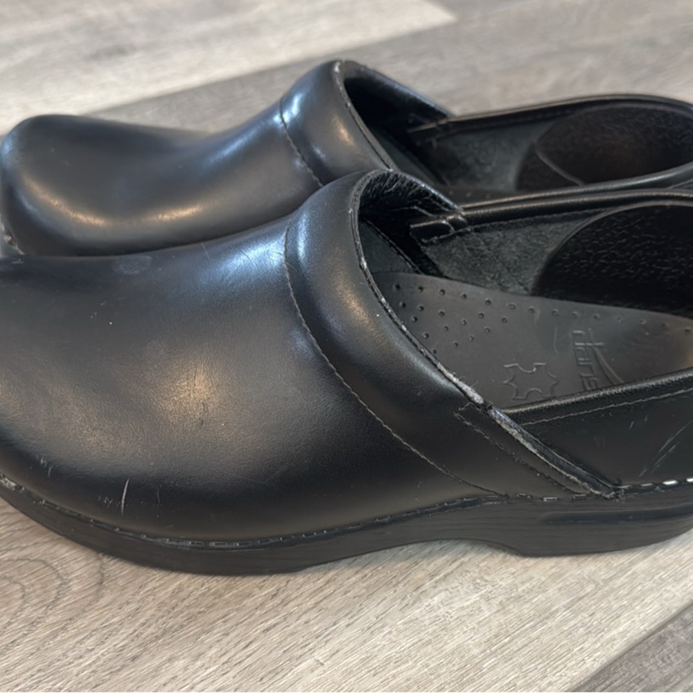 Dansko Black Mules Seamless Slip-On Design
